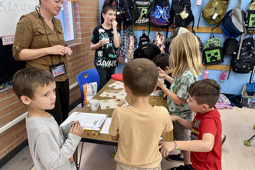 A group of kids coloring