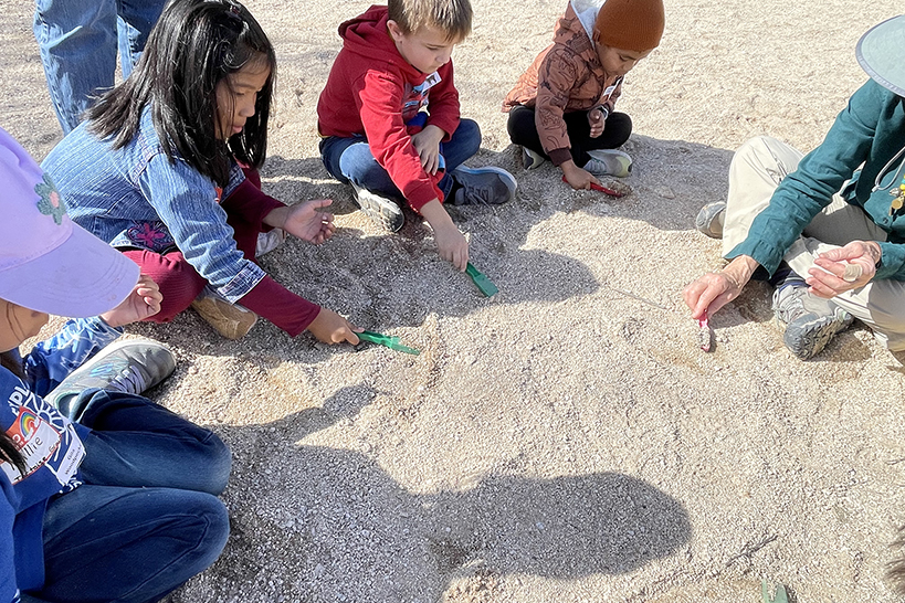 Kids play in the dirt